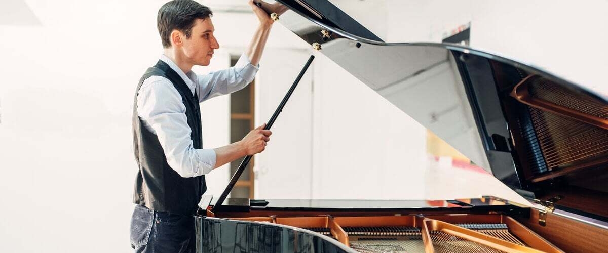 Piano movers cost & DIY tips to move it safely. banner image