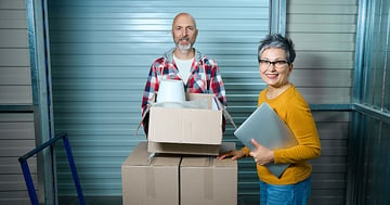Retiree Couple Downsizing and Moving Boxes