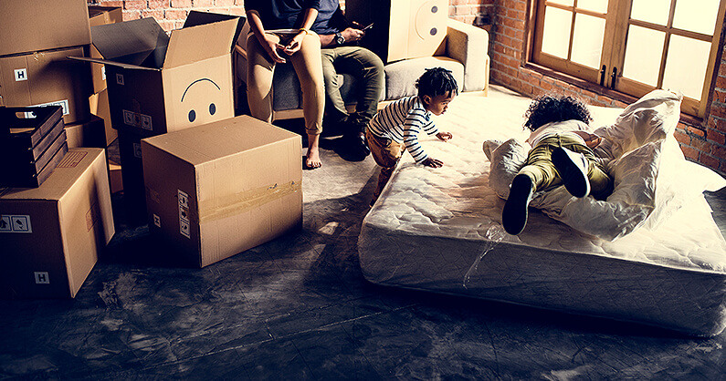 Family unpacking mattress