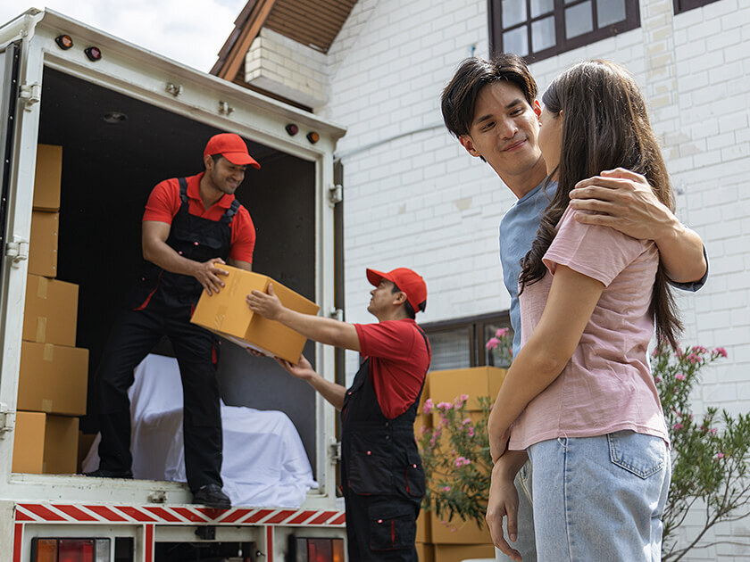Movers, truck and couple